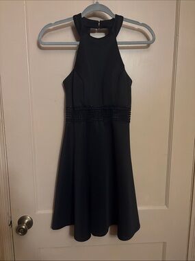 my michelle black dress Cut Out Maxi / | MESHKI the sleeveless shape is balanced with seamline paneling that sculpts the bodice Michelle Cut Out Mini Dress